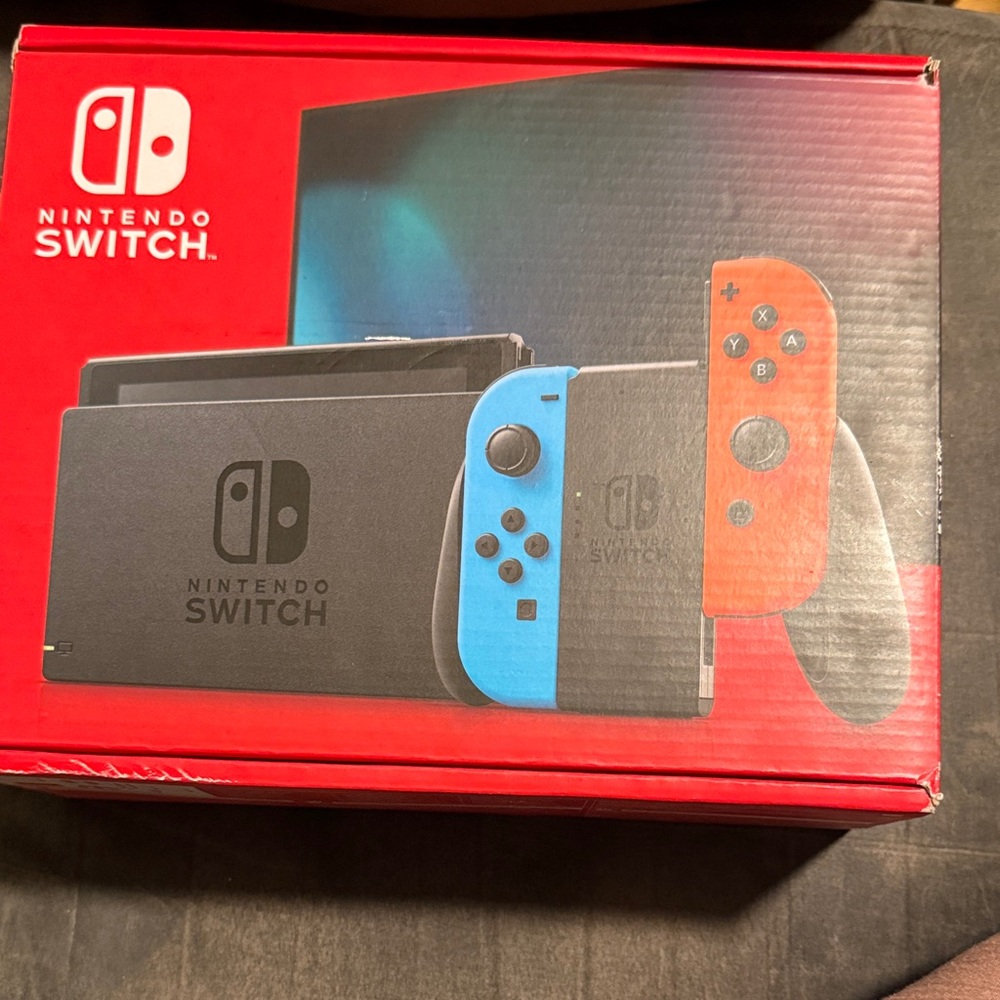 Nintendo Switch with Neon Blue Left and Neon Red Right Joy-Con